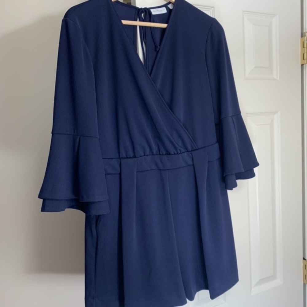 NYC navy v-cut stretch romper.